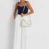 Bolso mediano de piel con lunares Ralph Lauren para mujer en color crema y azul marino francés Bolso mediano de piel con lunares Ralph Lauren para mujer en color crema y azul marino francés