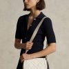 Bolsos Saddle de piel acolchada Ralph Lauren Polo ID para mujer en color marfil Bolsos Saddle de piel acolchada Ralph Lauren Polo ID para mujer en color marfil