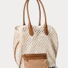 Bolsos tote Bellport grandes de crochet con ribete de cuero de Ralph Lauren para mujer en color crema pergamino Bolsos tote Bellport grandes de crochet con ribete de cuero de Ralph Lauren para mujer en color crema pergamino