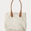 Bolsos tote Bellport grandes de crochet con ribete de cuero de Ralph Lauren para mujer en color crema pergamino Bolsos tote Bellport grandes de crochet con ribete de cuero de Ralph Lauren para mujer en color crema pergamino