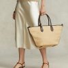 Bolsos tote Bellport medianos de paja con ribete de cuero Ralph Lauren para mujer Bolsos tote Bellport medianos de paja con ribete de cuero Ralph Lauren para mujer