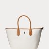 Bolsos tote medianos Bellport de lona reversible Ralph Lauren para mujer en color natural/azul marino Bolsos tote medianos Bellport de lona reversible Ralph Lauren para mujer en color natural/azul marino