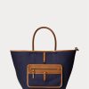Bolsos tote medianos Bellport de lona reversible Ralph Lauren para mujer en color natural/azul marino Bolsos tote medianos Bellport de lona reversible Ralph Lauren para mujer en color natural/azul marino