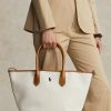 Bolsos tote medianos Bellport de lona reversible Ralph Lauren para mujer en color natural/azul marino Bolsos tote medianos Bellport de lona reversible Ralph Lauren para mujer en color natural/azul marino