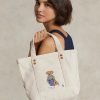 Bolsos tote pequeños Ralph Lauren New Orleans Polo Bear de lona color crudo para mujer Bolsos tote pequeños Ralph Lauren New Orleans Polo Bear de lona color crudo para mujer