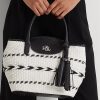 Bolsos tote Perri grandes de piel tejida con motivos geométricos de Ralph Lauren para mujer, en blanco y negro