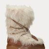 Botas Ralph Lauren Celia de piel de oveja y cuero bruñido en color crema para mujer Botas Ralph Lauren Celia de piel de oveja y cuero bruñido en color crema para mujer