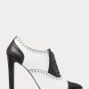 Botas Ralph Lauren Cerri de piel de becerro con bloques de color en blanco y negro para mujer Botas Ralph Lauren Cerri de piel de becerro con bloques de color en blanco y negro para mujer