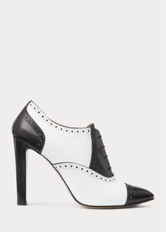 Botas Ralph Lauren Cerri de piel de becerro con bloques de color en blanco y negro para mujer Botas Ralph Lauren Cerri de piel de becerro con bloques de color en blanco y negro para mujer