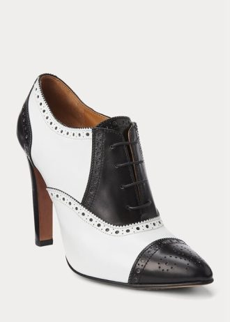 Botas Ralph Lauren Cerri de piel de becerro con bloques de color en blanco y negro para mujer Botas Ralph Lauren Cerri de piel de becerro con bloques de color en blanco y negro para mujer