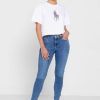 Camisetas blancas con cuello redondo y gráficos de Ralph Lauren para mujer