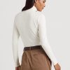Camisetas de cuello alto Ralph Lauren para mujer en color crema Camisetas de cuello alto Ralph Lauren para mujer en color crema