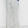 Pantalones deportivos con rayas laterales de Ralph Lauren para mujer en beige Pantalones deportivos con rayas laterales de Ralph Lauren para mujer en beige