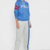 Pantalones deportivos con rayas laterales de Ralph Lauren para mujer en beige Pantalones deportivos con rayas laterales de Ralph Lauren para mujer en beige