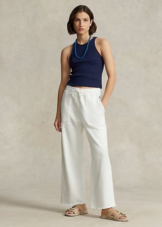 Pantalones deportivos de polar con dobladillo cortado de Ralph Lauren para mujer en blanco Pantalones deportivos de polar con dobladillo cortado de Ralph Lauren para mujer en blanco