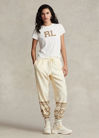 Pantalones deportivos de polar con motivo de copos de nieve de Ralph Lauren para mujer en color crema Pantalones deportivos de polar con motivo de copos de nieve de Ralph Lauren para mujer en color crema