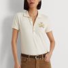 Polos de piqué con escudo y cuentas de Ralph Lauren para mujer en color crema Polos de piqué con escudo y cuentas de Ralph Lauren para mujer en color crema