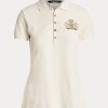 Polos de piqué con escudo y cuentas de Ralph Lauren para mujer en color crema Polos de piqué con escudo y cuentas de Ralph Lauren para mujer en color crema