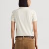 Polos de piqué con escudo y cuentas de Ralph Lauren para mujer en color crema Polos de piqué con escudo y cuentas de Ralph Lauren para mujer en color crema
