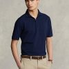 Polos Ralph Lauren de malla elástica con cremallera para hombre en azul marino