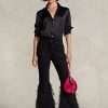 Vaqueros acampanados de tiro alto con ribete de plumas y cuentas de Ralph Lauren para mujer en color negro Vaqueros acampanados de tiro alto con ribete de plumas y cuentas de Ralph Lauren para mujer en color negro