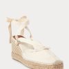 Zapatos planos de cuña de lona con flecos de Ralph Lauren para mujer en color crema