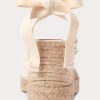Zapatos planos de cuña de lona con flecos de Ralph Lauren para mujer en color crema